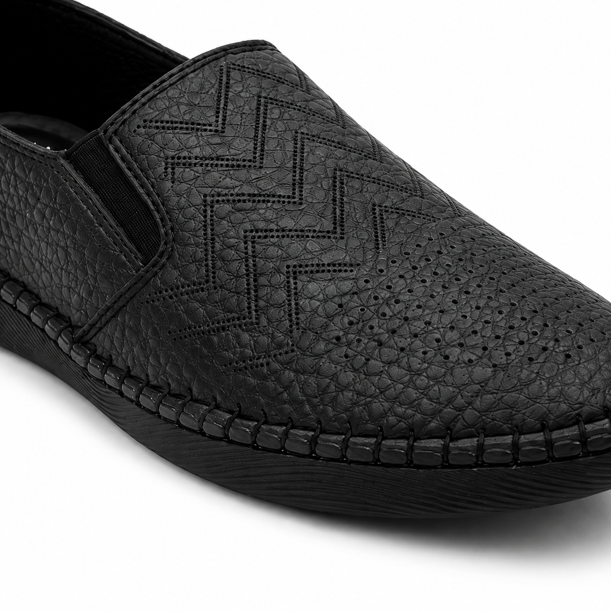 Slip-on flats with perforated geometric details
