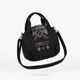 Textured Handbag With Ethnic Woven Front Panel